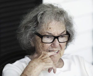 older woman appearing worried for elder abuse information