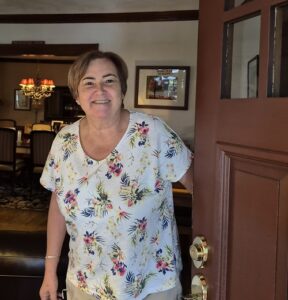 Marilyn, opening her front door